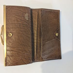 VTG Buxton, Brown Leather Wallet.  7" x 4" x 1" Made in Canada.